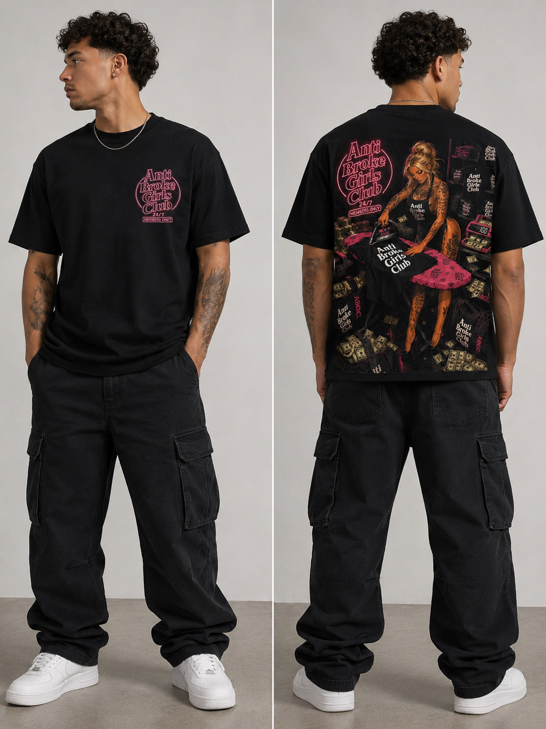 Person wearing a black t-shirt with graphic design on the front and back, standing against a plain background.